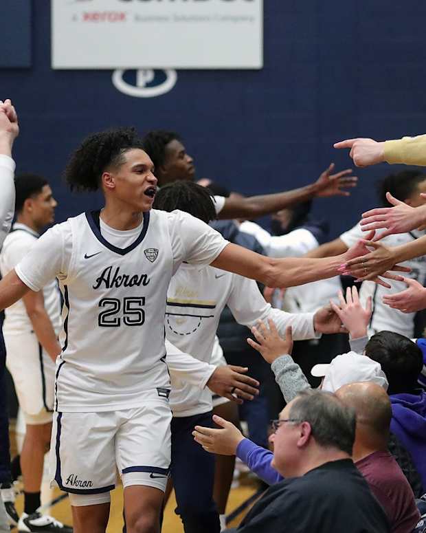 Akron Zips forward Enrique Freeman (25) celebrates with the Ak-Rowdies after beating the Eastern Michigan Eagles,46-44, in an NCAA basketball game, Saturday, Jan. 22, 2022, in Akron, Ohio.

Zipsmbb 1